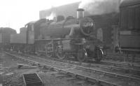 Ivatt class 2MT 2-6-0 no 46451, photographed standing in the shed yard at Hurlford in the 1960s. The locomotive was withdrawn from here at the end of 1966.<br><br>[K A Gray //1966]