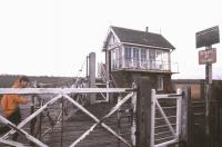 All part of the job. The signalman struggles with the crossing gates against the wind off the North Sea at Little Steeping on the East Lincolnshire line in February 1988. The station closed to passengers in 1961 but the line still sees traffic on what is now the Skegness branch. <br><br>[Ian Dinmore /02/1988]