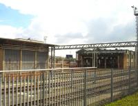 Landore maintenance depot on 19 April 2012, as seen from the 13.30 Fishguard to Cheltenham service running via the Swansea station avoiding line. <br><br>[David Pesterfield 19/04/2012]