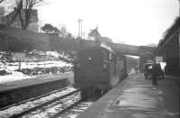 A northbound train entering West Kilbride on a snowy March day in 1963.<br><br>[R Sillitto/A Renfrew Collection (Courtesy Bruce McCartney) 15/03/1963]