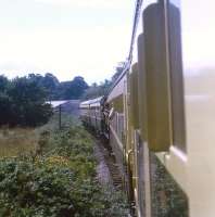 A 2+2 push-pull working with an 0-6-0PT sandwiched in between approaching Staverton on the Dart Valley Railway on 30 July 1969.<br><br>[John McIntyre 30/07/1969]