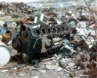 View over part of the scrapyard at Barry in July 1980. The NBL MAN power unit is from either D601 or D6122.<br><br>[Colin Alexander /07/1980]