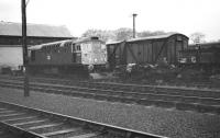 BRC&W Type 2 no 5324 receiving some attention in the yard outside Ferryhill shed in January 1973, with the right hand end of the locomotive on blocks and the bogie having been removed.<br><br>[John McIntyre /01/1973]