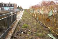 The infilled platform at the former Bathgate terminus, closed in December 2010, seen from the site of the buffer stops on 17 April 2012. [See image 31158]<br><br>[John Furnevel 17/04/2012]
