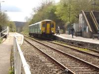 150250 picks up at Llandeilo on the 13.16 Swansea to Shrewsbury service. Token exchange takes place here for the continuation to next crossing point at Llandovery Station; all token exchanges at these stations plus at Llanwrtd and Llandrindod Wells being under the control of Pantyffynon Junction signaller.  <br><br>[David Pesterfield 11/04/2012]