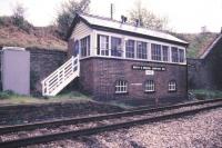 The signal box at Neath and Brecon Junction photographed in 1988. The box stands at the north end of Neath Riverside station (closed 1964). The bridge beyond carries the South Wales main line.<br><br>[Ian Dinmore /05/1988]