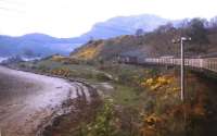 A full load for a Class 26 in Spring 1972, with two vans and seven coaches in tow. The train is en route to Inverness near Stromeferry.<br><br>[Frank Spaven Collection (Courtesy David Spaven) //1972]