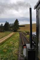 Sixty years after H.C. Casserley took a well known photograph from a Hexham bound train this photograph was taken from a northbound service on the approach to Saughtree courtesy of today's owners of the station, [Geoff & Meg Mann]. The station was beautifully restored from a ruin as a house. It is preserved in a wonderfully understated manner.<br><br>[Ewan Crawford 01/05/2012]