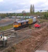 GBRf 66715 <I>Valour</I> passes construction works for Nuneaton's North Chord as it heads East with containers on Saturday lunchtime, 5 May 2012.<br><br>[Ken Strachan 05/05/2012]