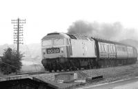 A class 47 powers south on the fast lines through Dunbar in August 1976.<br><br>[Bill Roberton /08/1976]