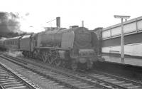 Late morning scene at Carlisle platform 3 in September 1963 as Stanier Pacific no 46249 <I>City of Sheffield</I> prepares to take out the 11am  to Glasgow St Enoch. The locomotive was withdrawn from Polmadie shed 2 months later.<br><br>[K A Gray 07/09/1963]