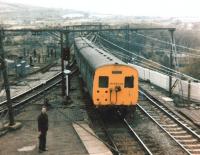 M59602M runs onto Dinting Viaduct after leaving the station on 21 April 1979 with a service for Manchester Piccadilly.<br><br>[Colin Alexander 21/04/1979]