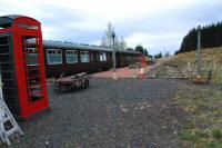 The location formerly known as Whitrope Siding is gradually becoming a station. (That telephone box, could it be from Riccarton Junction? [see image 24900]) The view is towards Riccarton and the railway cottage is beyond the line off to the left.<br><br>[Ewan Crawford 01/05/2012]