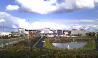 Scene at the former London Road goods depot in April 2012. The East End Regeneration Route is to the left of the pretty landscaping, with the new Velodrome in the background see image [[38770]].<br><br>[Colin Harkins 22/04/2012]