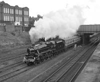 Preserved Black 5 No. 5305 sets off from Leeds on 30 April 1977 and takes the Harrogate line at Wortley Junction on the loco's first public outing after restoration to main-line running order by the Humberside Locomotive Preservation Group. The 4-6-0 worked the railtour (organised by the HLPG) through to Scarborough and is thought to have brought it back to Leeds, although it had only been advertised to do so as far as York (with thanks to Vic Smith).<br><br>[Bill Jamieson 30/04/1977]