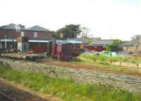 Tywyn Wharf station and yard seen on 8 May 2012 from a passing Arriva Trains Wales Cambrian Coast line service.<br><br>[David Pesterfield 08/05/2012]