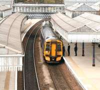 The 14.13 Dunblane - Glasgow Queen Street calls at Stirling on 10 May 2012.<br><br>[John Furnevel 10/05/2012]