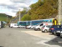 158828 stands in the yard to the east of Arriva Trains Wales Machynlleth maintenance depot in May 2012. The former 89C steam shed, used for under-body and bogie cleaning, can be seen in the distance to the left of the unit. The white building on the extreme left is the new Network Rail ERTMS signalling centre for the entire Cambrian Coast Line .<br><br>[David Pesterfield 08/05/2012]