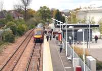 Passengers disembark from the 12.18 ex-Glasgow Queen Street following its arrival at Alloa on 9 May 2012. <br><br>[John Furnevel 09/05/2012]