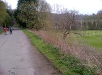 On the left, we see the trackbed of the Cam Valley line immortalized in 'The Titfield Thunderbolt'. In the distance, we see the road viaduct for the A36. And on the right, the cricket pitch used in the classic Ealing comedy; now used by Monkton Combe school.<br><br>[Ken Strachan 07/04/2012]