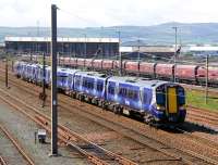 Scene at Falkland Yard on 12 May 2012 with the 11.13 Ayr - Glasgow Central passing through.<br><br>[Colin Miller 12/05/2012]