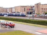 A fine array of semaphore signals greets the 13.48 Glasgow Queen Street - Dunblane DMU on 9 May as it approaches the south end of Stirling station.<br><br>[John Furnevel 09/05/2012]