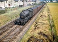 A train for Fife heads north past the houses of Broomhall in July 1959 behind Gresley V3 2-6-2T no 67672.<br><br>[A Snapper (Courtesy Bruce McCartney) 25/07/1959]