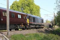 The Class 67s have been used for Royal Train duties since 2003. Here the claret liveried 67006 <I>Royal Sovereign</I> is seen at Lancaster on the rear of the train conveying HM The Queen and HRH The Prince of Wales to Diamond Jubilee engagements in Lancashire.<br><br>[Mark Bartlett 16/05/2012]