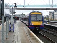 What a difference a day makes - or a half-century. Platform 7 at Stirling on 17 May 2012, with the 15.53 to Queen Street awaiting its departure time. [See image 20536] for the same view in 1962!<br><br>[Colin Miller 17/05/2012]