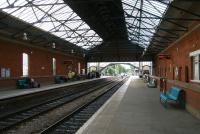 View south towards Hull through Beverley station in October 2008, In the background is Armstrong Way level crossing and signal box.<br><br>[John Furnevel 01/10/2008]