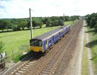 A Northern service from Blackpool North to Liverpool Lime Street heads south from Balshaw Lane Junction towards the next scheduled stop at Wigan on 17 June 2007. <br><br>[John McIntyre 17/06/2007]