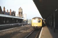 Platform scene at Bury St Edmonds in February 1980 as a DMU waits to depart for Ely.<br><br>[Ian Dinmore /02/1980]