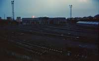 An evening view of Eastfield MPD after closure with some track lifting back in 1994. Really not my best work but as it is the only photograph I took at the time showing the shed in this condition it may be worth including. Guess who set the wrong filmspeed? <br><br>[Ewan Crawford //1994]