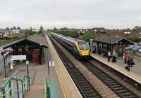 A May 2012 Sunday evening at Brough sees Hull Trains <I>Adelante</I> unit 180111 call on a service bound for Kings Cross. During the same week the nearby aircraft factory received the welcome news of a new contract for Hawk jets from Saudi Arabia. Brough station dates from 1840 and trains formerly ran on both sides of the two island platforms. <br><br>[Mark Bartlett 20/05/2012]