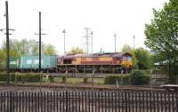 EWS 66096 passing the GWS site at Didcot with a container train on 17 May heading east towards Reading.<br>
<br><br>[Peter Todd 17/05/2012]