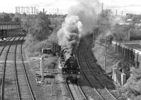 Preserved Black 5 No. 45231 makes a smoky departure from Carlisle as it approaches St. Nicholas Bridge with the southbound 'Fellsman' on 14th September, the last day of operation in 2011. The disused goods lines from London Road Junction to Rome Street Junction are on the left.<br><br>[Bill Jamieson 14/09/2011]