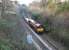 A permanent way train heading for Millerhill yard running through the deep cutting between Craiglockhart and Morningside Road on the Edinburgh 'sub' in January 2005. The locomotive is EWS 66106. <br><br>[John Furnevel 06/01/2005]