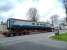 Quite a sight at Newcastleton on 16 April 2012. Mk 2 RFO no 1215 in InterCity blue and grey livery passes through on a low-loader heading for the Waverley Heritage Centre at Whitrope.<br><br>[Bruce McCartney 16/04/2012]
