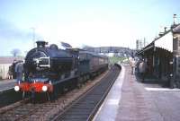 Platform scene at Anstruther in the early 1960s with Class J37 0-6-0 no 64602 at the head of a railtour from Dundee. Anstruther station closed to passenger traffic in September 1965.<br><br>[Robin Barbour Collection (Courtesy Bruce McCartney) //]