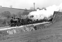 Hardwicke and the Midland Compound burst out from under Cragg Lane Bridge, west of Eldroth on the Settle Junction to Carnforth line on 24 April 1976. No 1000 is unfortunately partly obscured by its own exhaust steam. [See image 37313]<br><br>[Bill Jamieson 24/04/1976]