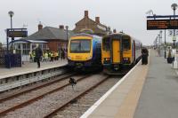 TPE 170302, newly arrived at Cleethorpes from Manchester Airport, has cleared the single line section from Grimsby, which will allow Northern 153324 to make another trip to Barton-on-Humber. This branch service is isolated from the rest of the Northern network and the <I>bubble car</I> was crewed by First TPE staff.<br><br>[Mark Bartlett 21/05/2012]