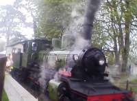 King Haakon VII - a Norwegian Railways 2-6-0 - helps the surrounding vegetation to get its daily quota of nice, nutritious carbon dioxide on the standard gauge line at Bressingham in summer 2006.<br><br>[Ken Strachan //2006]