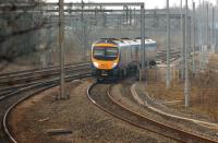 A First TPE service to Manchester Airport leaves the WCML at Euxton Junction on 22 March and takes the route via Chorley and Bolton.<br><br>[John McIntyre 22/03/2012]
