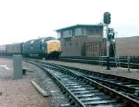 Deltic 55014 <I>'The Duke of Wellington's Regiment'</I> seen unexpectedly passing Cowlairs signal box with a parcels train in February 1980. Photographed from the Eastfield shed sidings.<br><br>[Colin Alexander /02/1980]