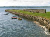 View south to Limekilns Pier and the River Forth on 1 June. To the left of the wall was the terminus of Lord Elgin's Waggonway of 1773 which brought coal from his pits in the Dunfermline area until superceded by the development of Charlestown Harbour the following century.<br><br>[Bill Roberton 01/06/2012]