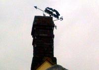 Detail view of the weather vane at Wellow, Somerset, in April 2012. It actually looks like an S&D locomotive, which is not such a common situation as you might think. [See image 38866].<br><br>[Ken Strachan 06/04/2012]