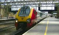 Virgin Voyager 221115 'William Baffin' arrives at Carlisle platform 3 on 26 May with train 1S47, the 12.00 Birmingham New Street to Glasgow Central.<br><br>[Ken Browne 26/05/2012]