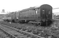 KDE 320983 (ex SC86774E) 1928 York, a 3-compartment Gresley Brake. Formerly of Irvine CS & TE, also chalked for S&T Perth. Awaiting disposal in Sawmill sidings, Leith Walk East, in February 1978.<br><br>[Bill Roberton 08/02/1978]