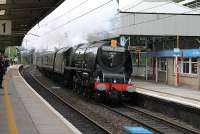 With the iconic headboard on the smokebox 46233 <I>Duchess of Sutherland</I> hurries the <I>Royal Scot</I> north through Oxenholme on 9th June 2012. <br><br>[Mark Bartlett 09/06/2012]