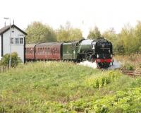 <I>'The Cathedrals Explorer'</I> draws to a halt at Forres east on 22 May 2012 behind A1 Pacific no 60163 'Tornado' and awaits the arrival of the 10.14 Aberdeen - Inverness service.<br><br>[John Furnevel 22/05/2012]